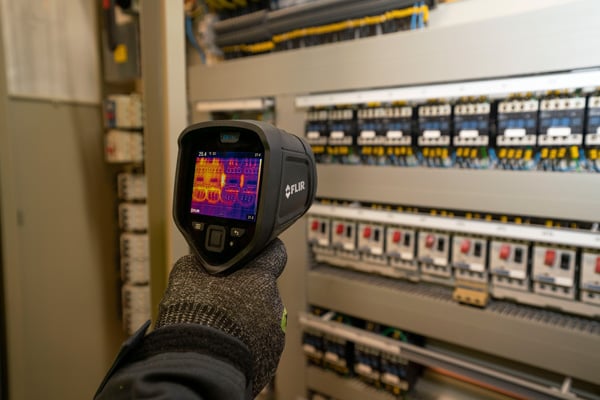 Thermal imaging camera scanning a live switchboard